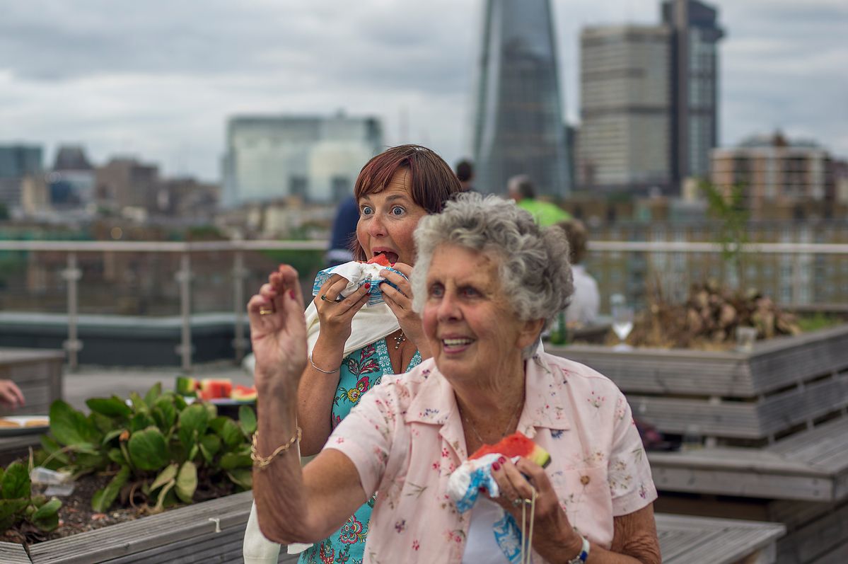 Grandma misbehaving throwing watermelon pips....